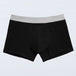 TENA Men Protective Boxers Light, featuring a close-up of black and grey boxer briefs designed for light incontinence with ergonomic Secure Absorption Zone.
